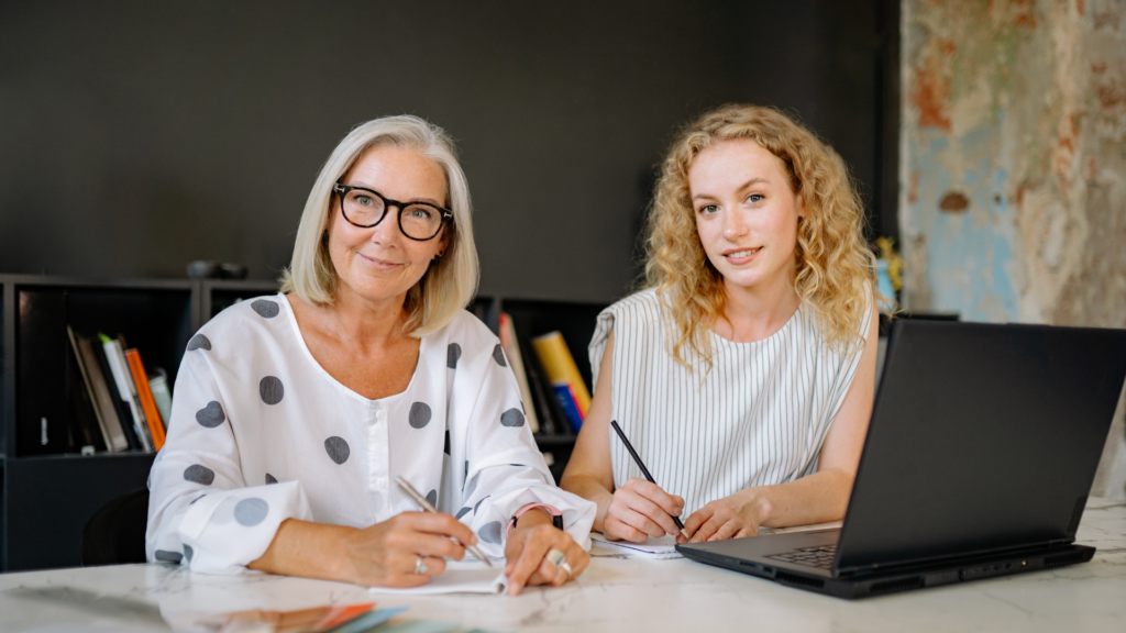A business owner reviewing booking and revenue data to improve her photoshoot rental business.