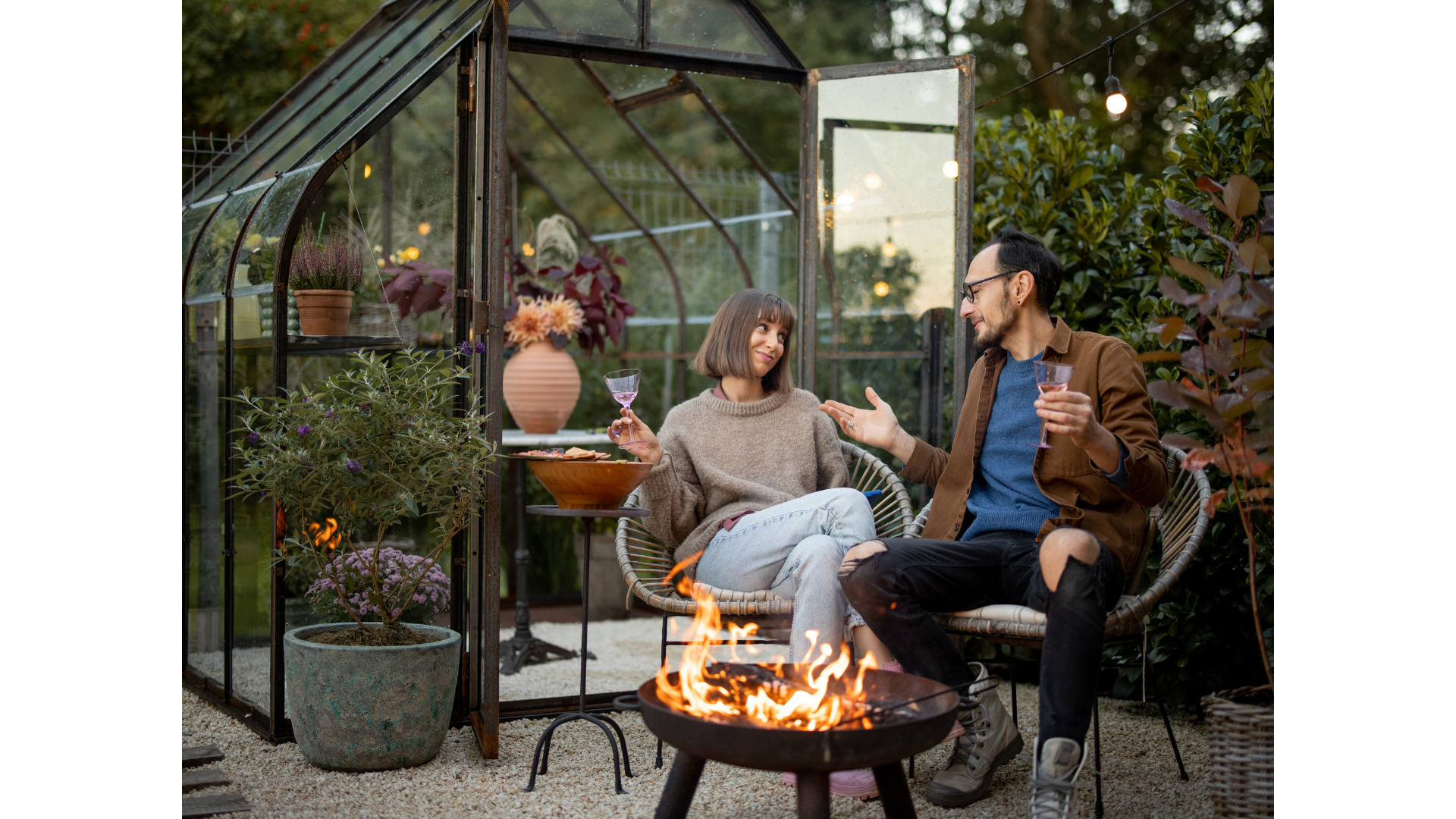  A seating area with comfortable chairs and a table, providing a relaxing space for clients.